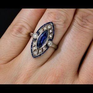 Sliver cubic zirconia/sapphire Art Deco ring.